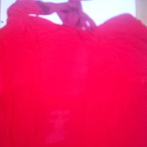 Red long sleeve shirt with tear drop opening